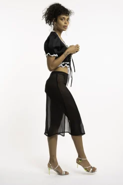 MaisonCléo Blouses>Blouse en coton noir brodée avec des marguerites