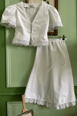 MaisonCléo Jupes>Jupe MARGARITA mi-longue évasée en coton blanc et broderie anglaise avec grosses fleurs