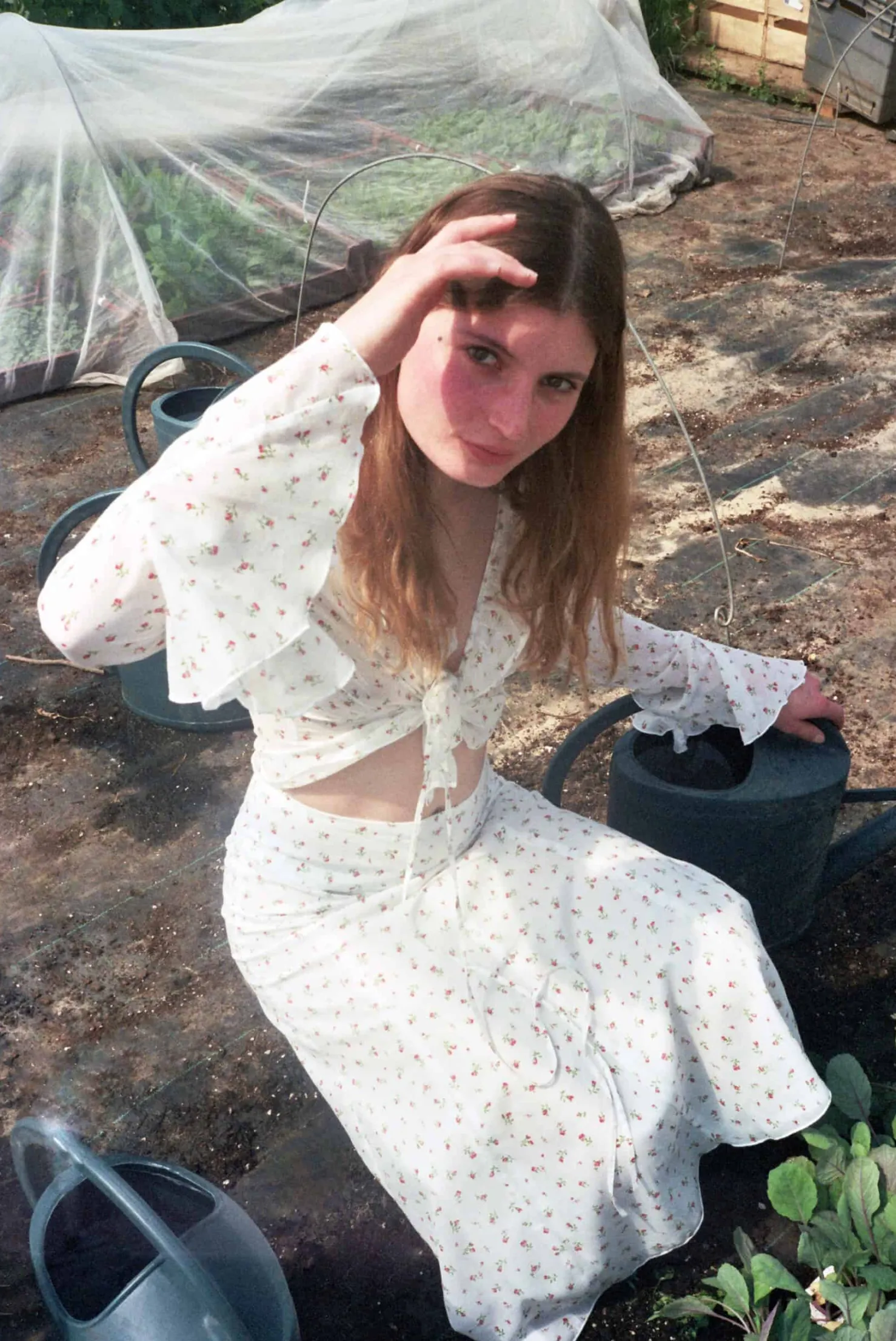 MaisonCléo Jupes>Jupe midi évasée en coton blanc à motif fleurs roses
