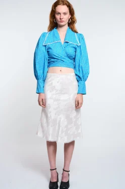 MaisonCléo Jupes>LA POUPETTE DÉFILÉ LOOK 3 – Jupe midi soie fleurie blanche avec dentelle AELWENN