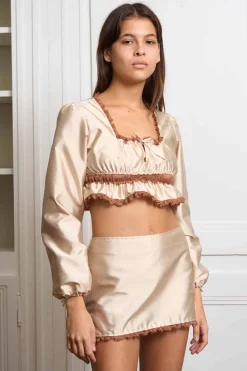 MaisonCléo Jupes>Mini jupe beige ANNA en soie avec dentelle et liens