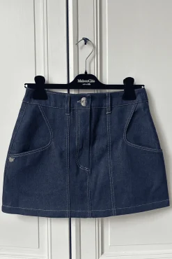 MaisonCléo Jupes>Mini jupe en coton denim avec poches arrondies
