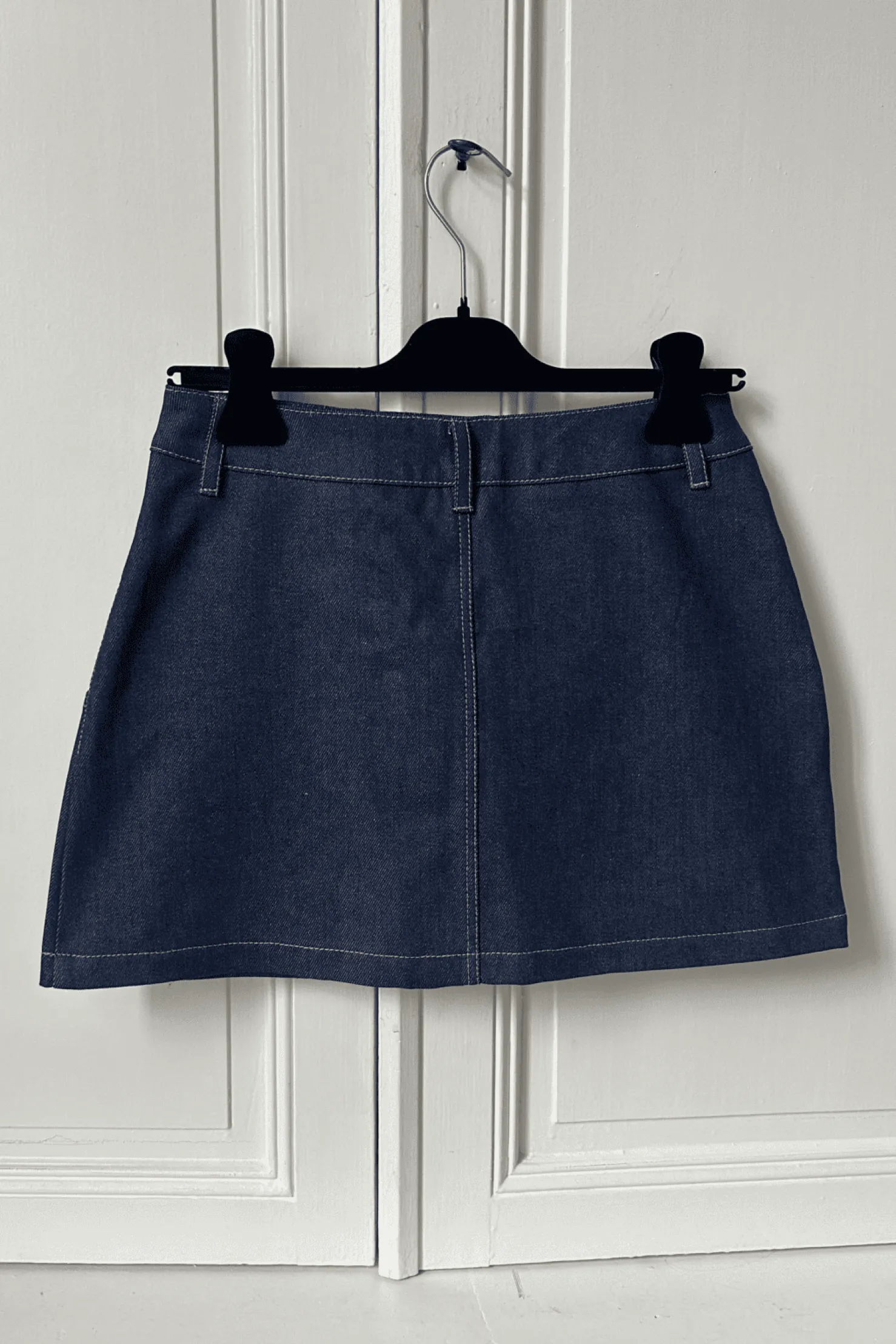 MaisonCléo Jupes>Mini jupe en coton denim avec poches arrondies