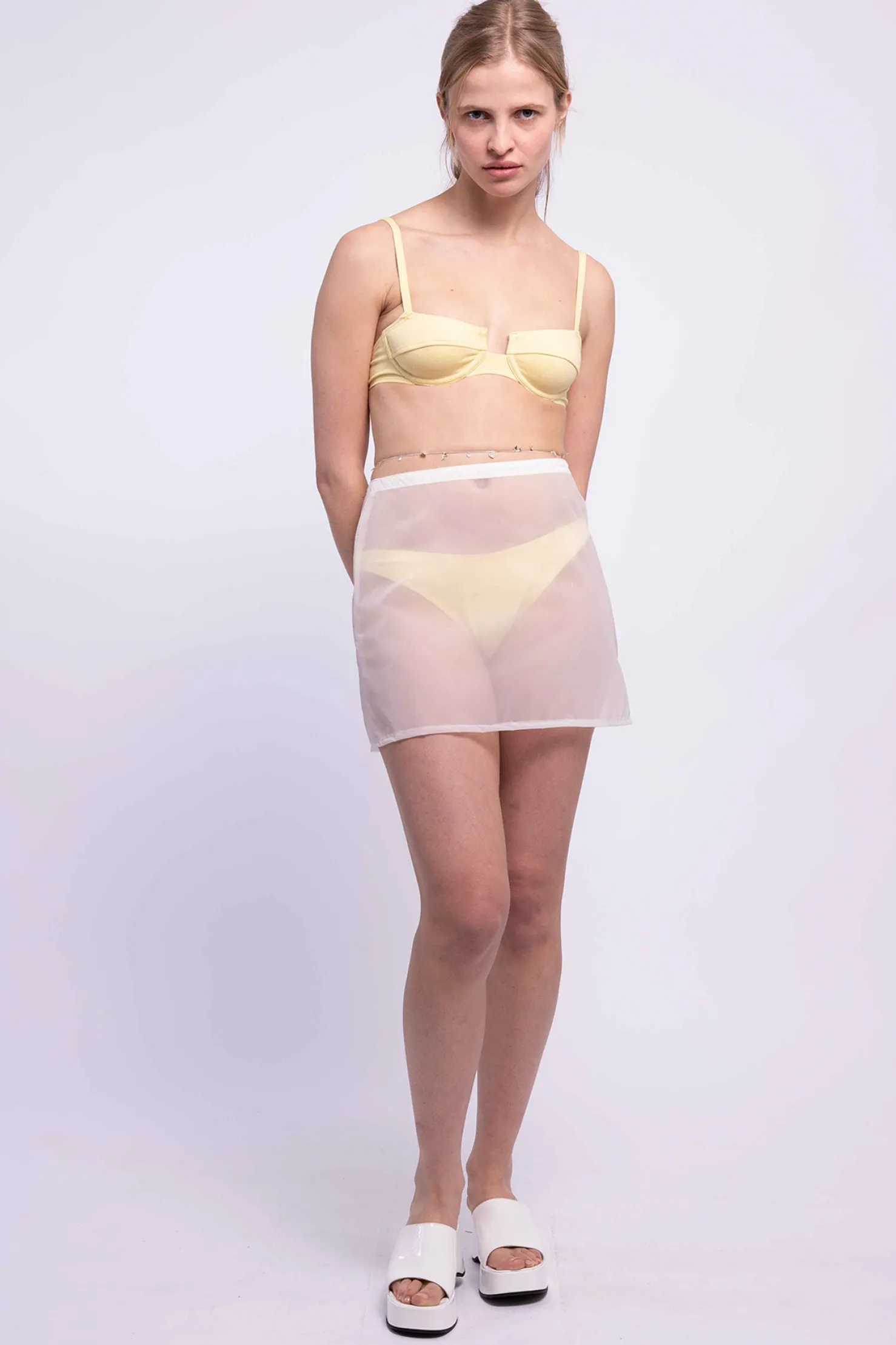 MaisonCléo Jupes|Maillot De Bain>RUNWAY LOOK 19 – Mini jupe trapeze blanche transparente style imperméable