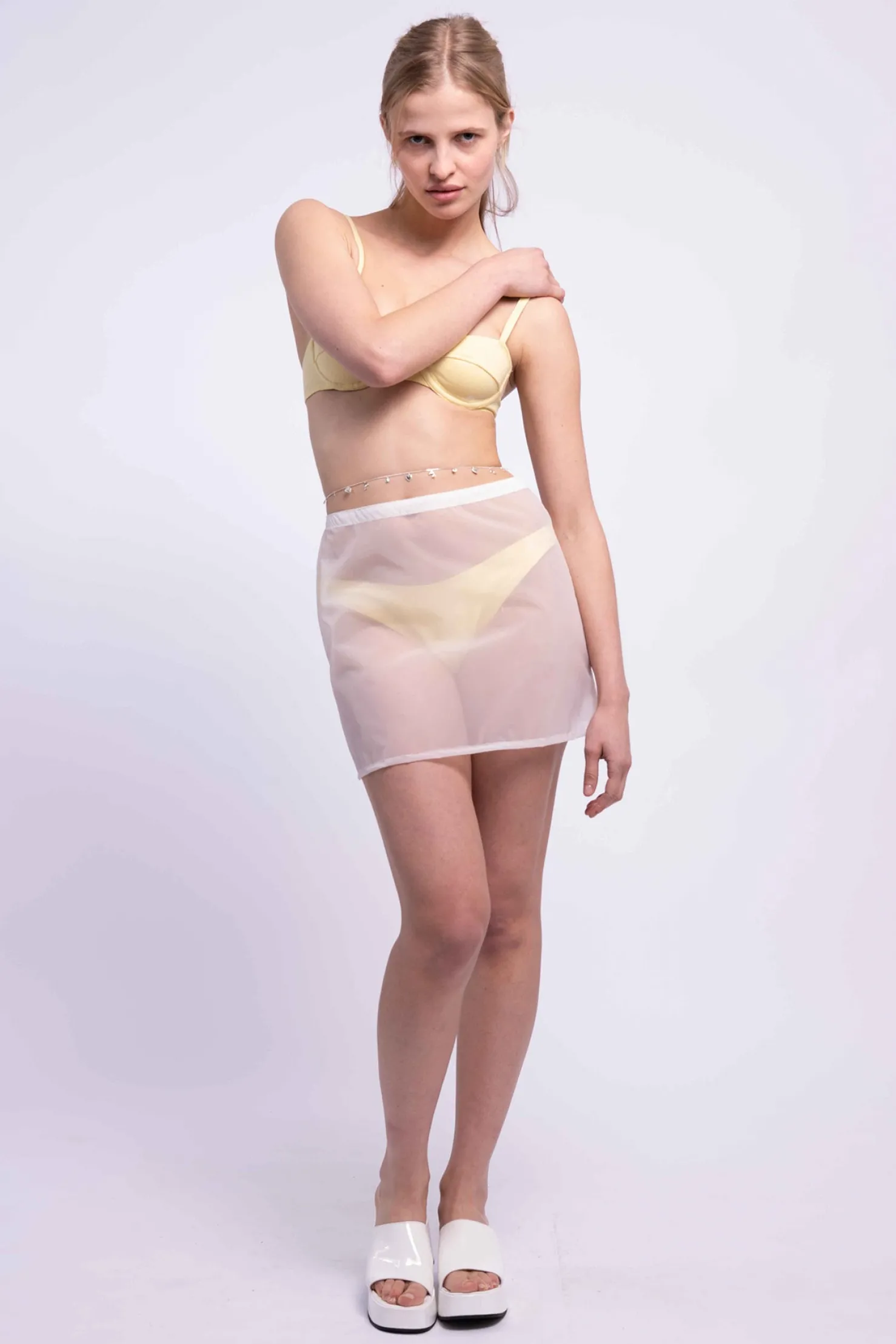 MaisonCléo Jupes|Maillot De Bain>RUNWAY LOOK 19 – Mini jupe trapeze blanche transparente style imperméable
